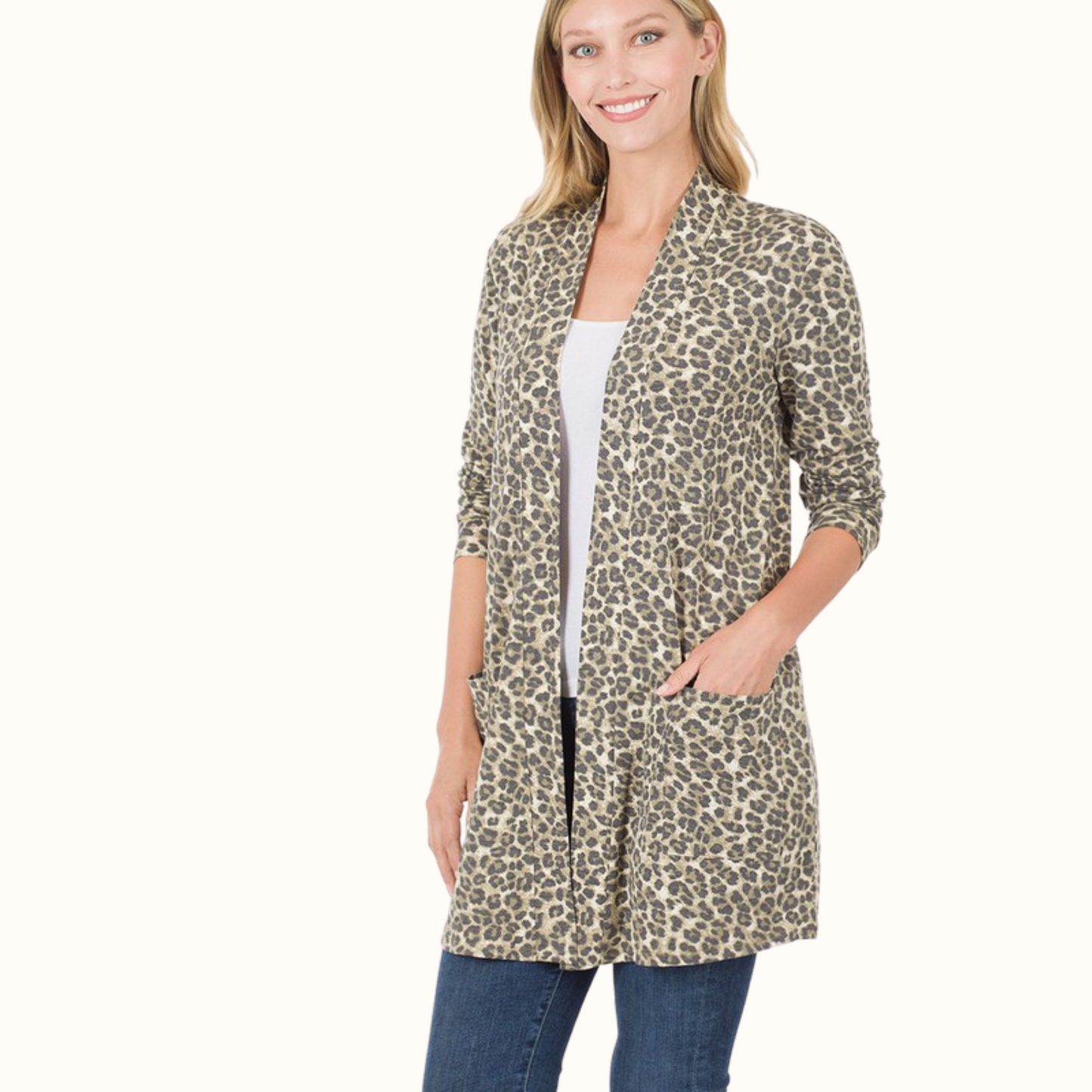 Embrace your wild side with our chic leopard print cardigan. Crafted from a soft and luxurious fabric, this statement piece adds a touch of fierce style to any outfit. The classic leopard print design exudes sophistication and versatility, making it the perfect layering piece for any season. Whether you're dressing up for a night out or keeping it casual for a day in, this cardigan is sure to turn heads and elevate your look. Stay cozy and on-trend with our must-have leopard cardigan.